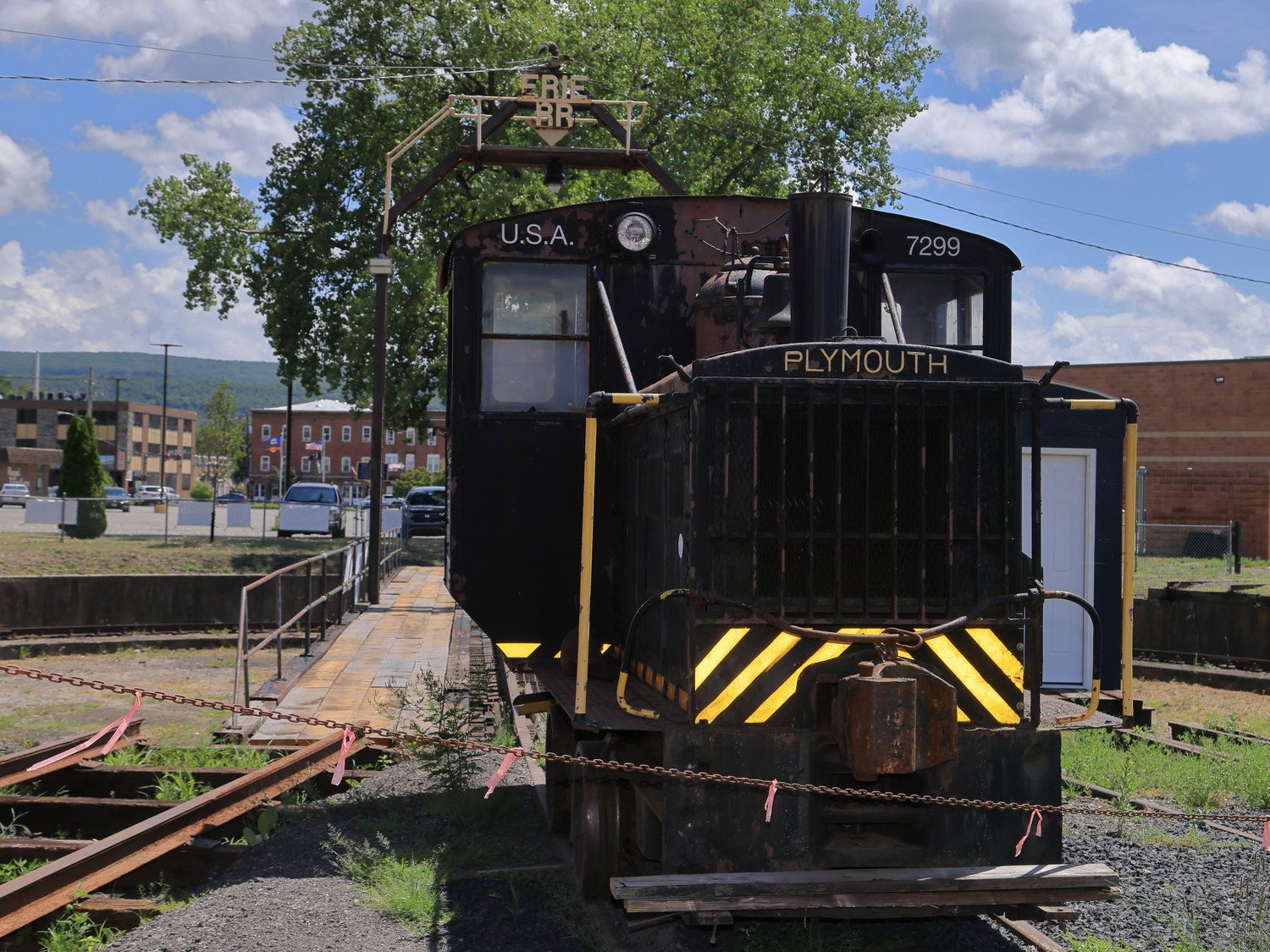 Locomotive No. 7299, seen here juxtaposed with the turntable at Port Jervis, was built by the Plymouth Locomotive Works of Plymouth, OH, a specialty manufacturer of small industrial locomotives. The diminutive 18-ton locomotive was built for the U.S. Army, and rolled off the assembly line on October 13, 1941.